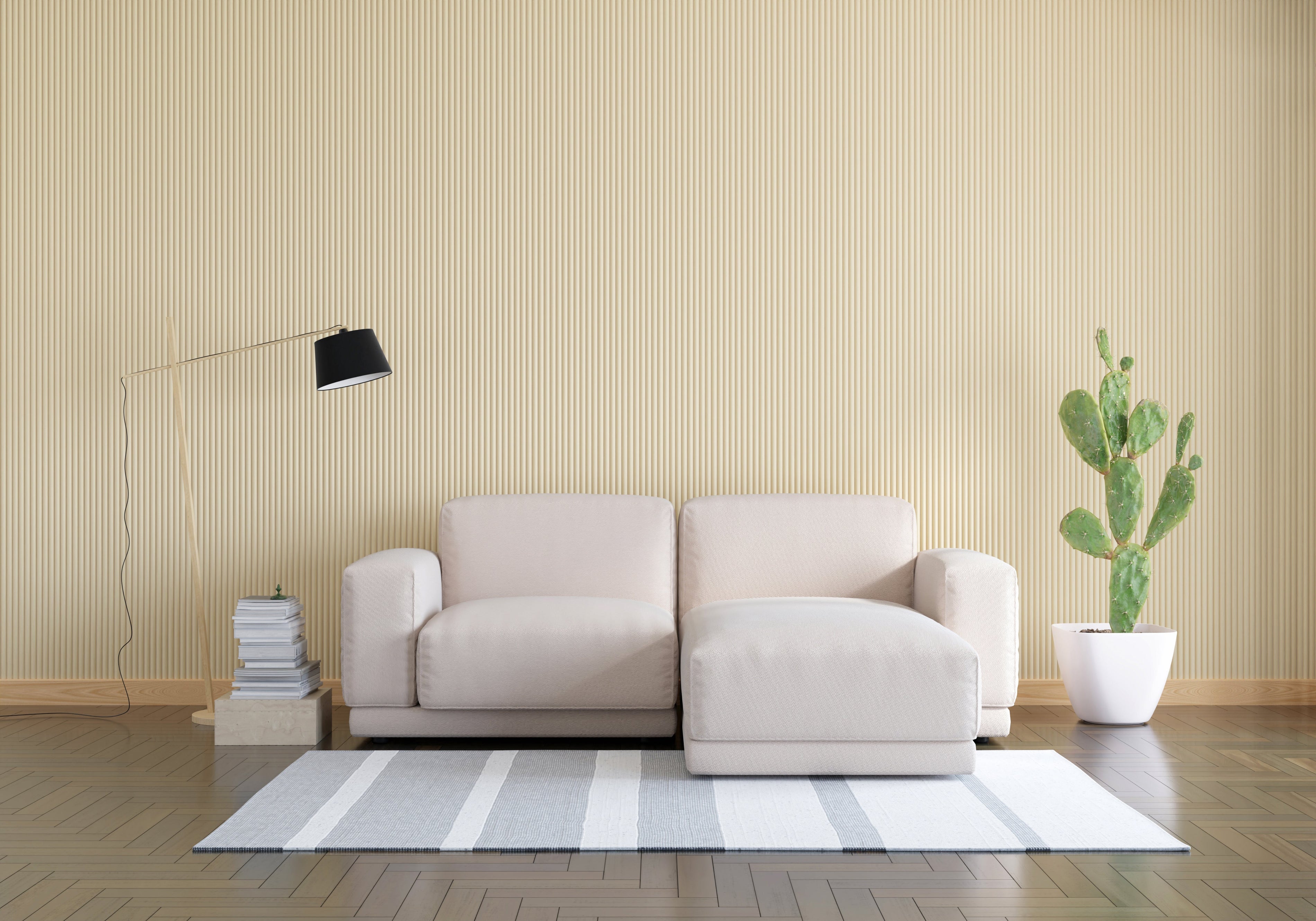 A modular sofa assembled in a bright, minimalist living room